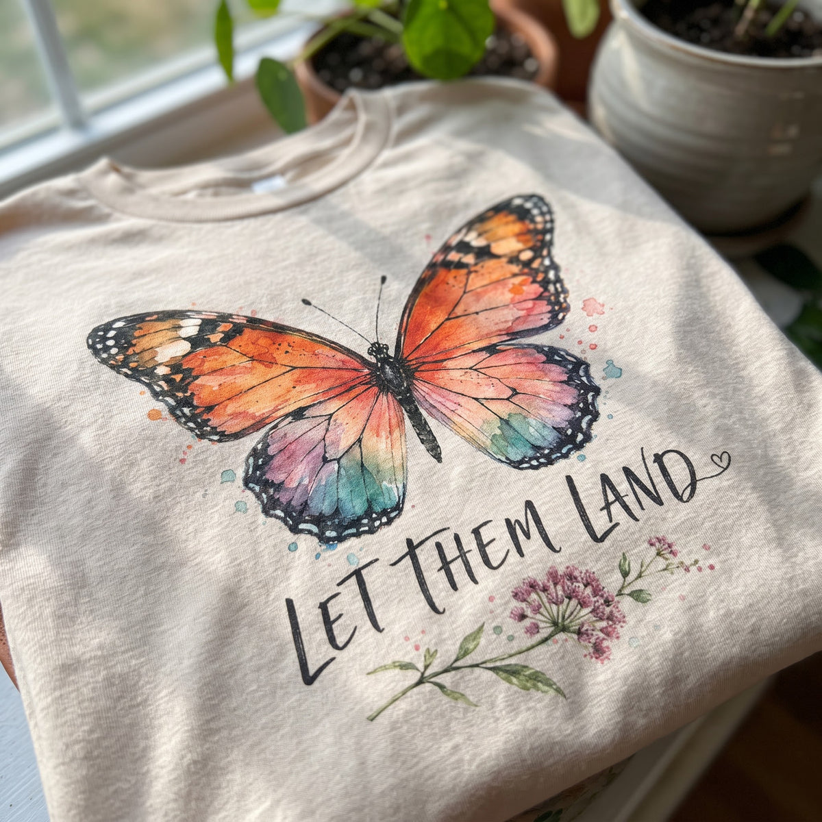 Let Them Land T-Shirt